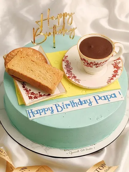 Another view of the charming tea and rusk cake, a heartwarming and personalized design for a father's birthday.