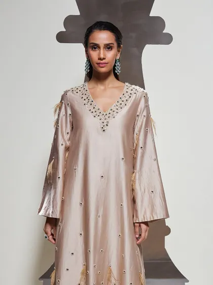 A detailed shot of the Dara Kurti Set's neckline, highlighting the exquisite hand embellishments that make this piece a work of art.
