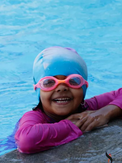 Happy faces in the pool are our greatest reward. These close-ups capture the confidence our students feel after mastering a new skill.