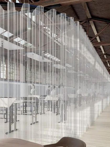 A semi-transparent curtain divides a workshop area in the Solina Silk Factory concept. This illustrates our idea for creating flexible, multi-use zones within the large, open-plan factory floor.