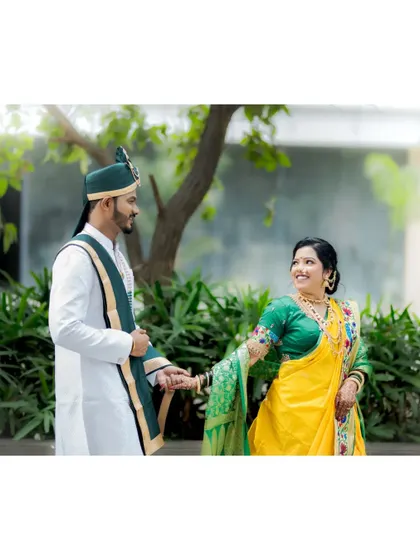 The bride playfully leads the groom by the hand, a classic shot that symbolizes the start of their shared path.