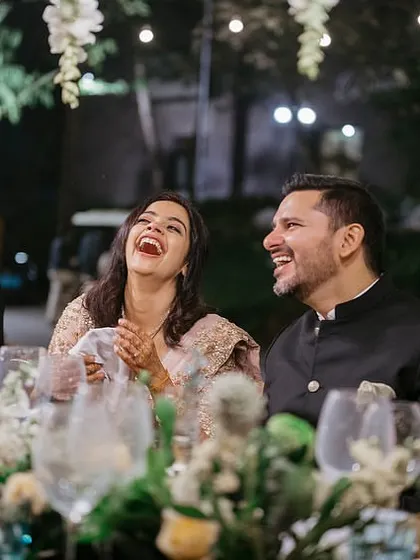 Pure laughter and joy at Neha and Tushar's wedding dinner. Creating a warm, comfortable, and beautiful environment allows our clients and their families to relax and simply enjoy these precious moments together.