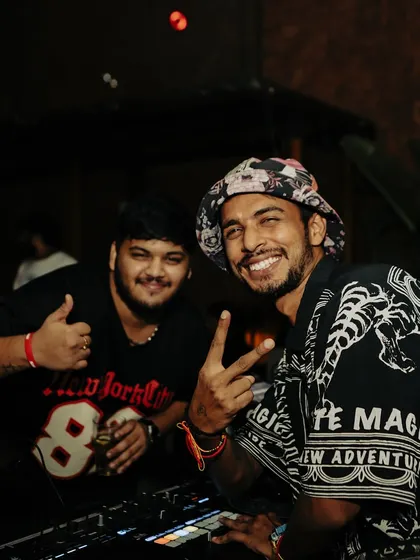 Posing with a friend behind the decks. These events are not just about music, but also about the connections you make along the way.