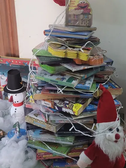 Our very own Christmas tree made from books! It's a perfect symbol of our love for reading and the holiday season, complete with a friendly Santa.