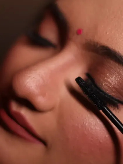 This macro shot focuses on mascara application, a small but vital step for opening up the eyes. I teach students how to apply mascara without clumping for long, defined lashes.