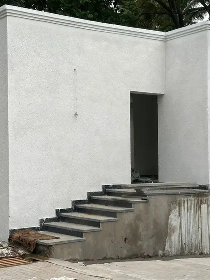 An earlier construction photo of the same building, before the final finishes were applied.