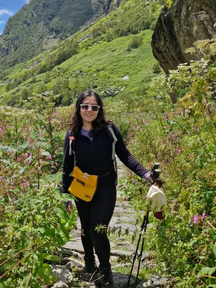 All smiles on the trail in the Valley of Flowers. Surrounded by lush greenery and wildflowers, every step of this Himalayan trek felt like walking through a dream.
