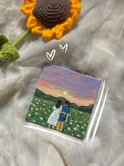 A beautiful custom painting of a couple in a field of white flowers at sunset. I work from your photos to create these romantic scenes.