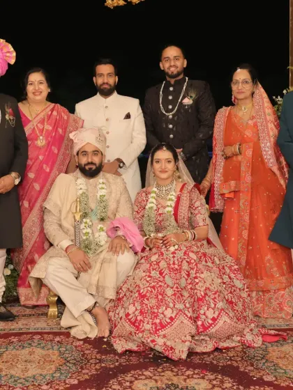 The beautiful wedding portrait of Harshita and Himij, surrounded by their loving families. Their journey from being Art Excel kids to life partners shows how deep-rooted values can lead to a lifetime of harmony.