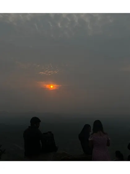 Watching the sunrise with new friends at Huthridurga. It is a peaceful and beautiful way to start the day.