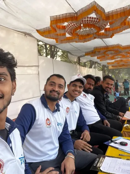 A selfie from the officials' tent, capturing the camaraderie among our umpires. They work hard, but also enjoy being part of the game they love.