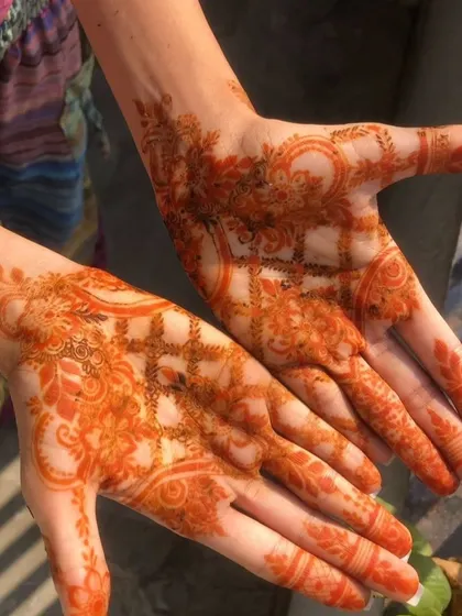 Look at that fresh, vibrant orange stain! This is the first stage of my organic mehendi working its magic. This beautiful color is the sign of a pure, chemical-free paste that will darken into a rich brown.