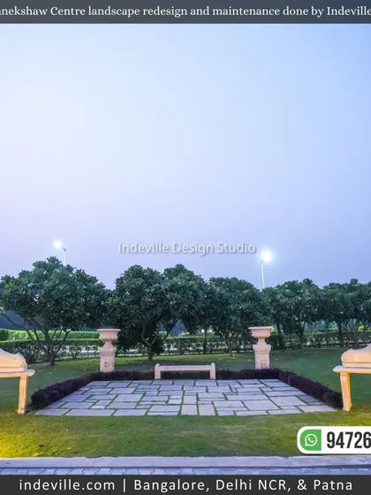 An elegant stone seating area at dusk, part of the expansive landscape at Manekshaw Centre.