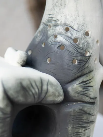 This powerful sculpture, "The Arm of a Western Hoolock Gibbon," was created by one of our foundation students. It tells the tragic true story of Kalia, the Lost Gibbon of Assam, and stands as a statement on ecosystem loss and animal abuse.