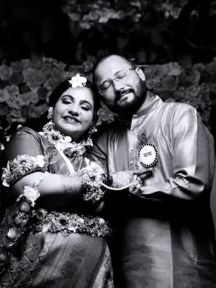 A timeless black and white portrait of a couple at their baby shower. This style brings a different emotion, focusing purely on their expressions and connection.
