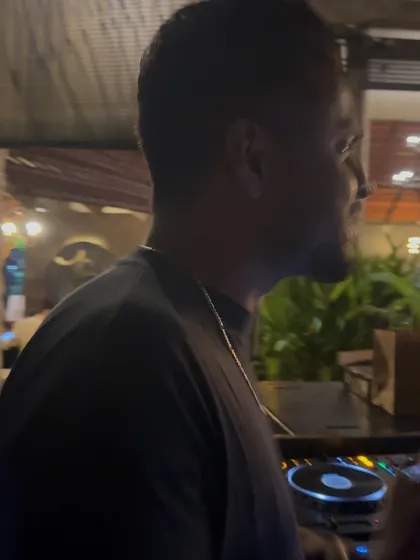 A profile shot of me at the decks. This shows my concentration and connection to the music I'm playing.