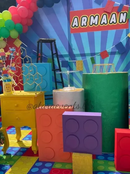 Building a fun-filled birthday, one brick at a time! This LEGO-themed party features giant LEGO block props and a colorful backdrop, perfect for a creative and hands-on celebration.