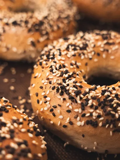 The finished product. A tray of perfectly golden-brown, shiny, and chewy bagels, ready for our breakfast sandwiches or to take home.