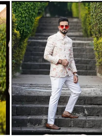 Embracing a minimalistic and elegant approach for a wedding function in Pune. This floral jacket on white is perfect for a sundowner event.