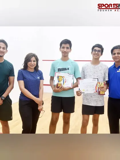 The winners and runners-up of the senior squash tournament pose with our coaches. It was a fantastic event showcasing great sportsmanship.