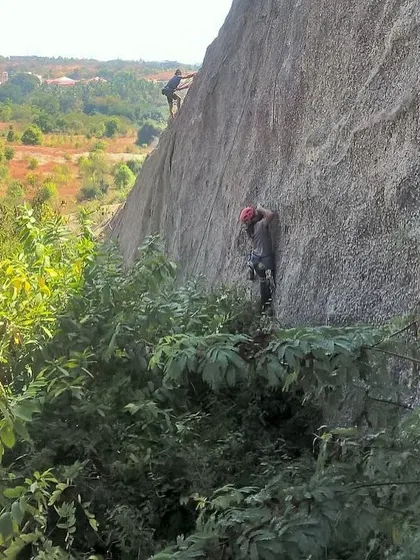Two climbers on a route at the Rasta Cafe crag. This area offers a mix of sport and trad climbing, reflecting the diverse interests of our community.
