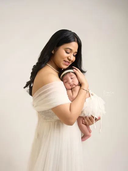 This is the magic I live to capture. The quiet moment when a mother holds her entire world, a feeling so profound it needs no words. I want you to remember this exact feeling forever.