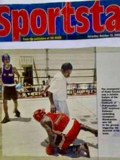 A newspaper clipping from my 2005 Senior National silver medal win. My career has spanned decades, fighting in different weight classes and winning championships across India.