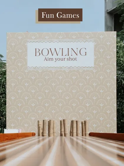 Interactive games like this custom bowling alley are a great way to break the ice and get guests mingling during pre-wedding functions.