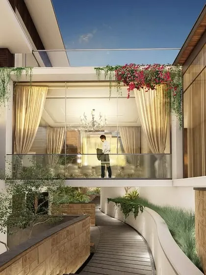 We designed this opulent bungalow in Rajasthan to create a dance between architecture and landscape. Cantilevered elements and dynamic movement areas invite exploration on each level, unveiling new perspectives and hidden delights throughout this elegant home.