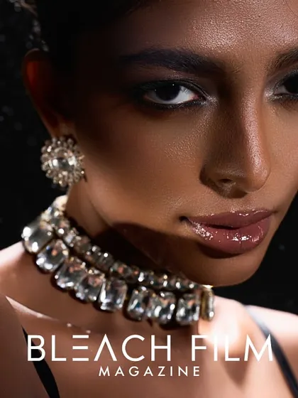 A beauty shot for Bleach Film Magazine, focusing on the details of the jewellery and the glossy texture of the makeup.