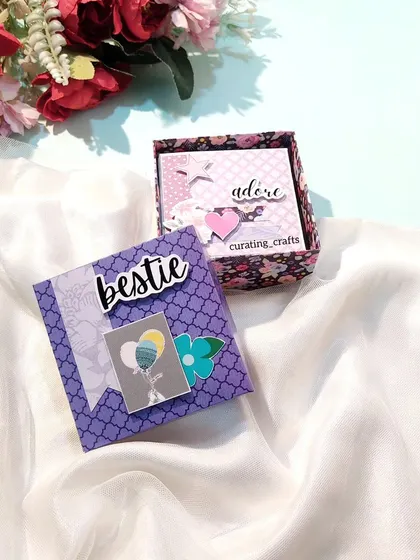 A different angle of the purple-themed best friend mini scrapbook.