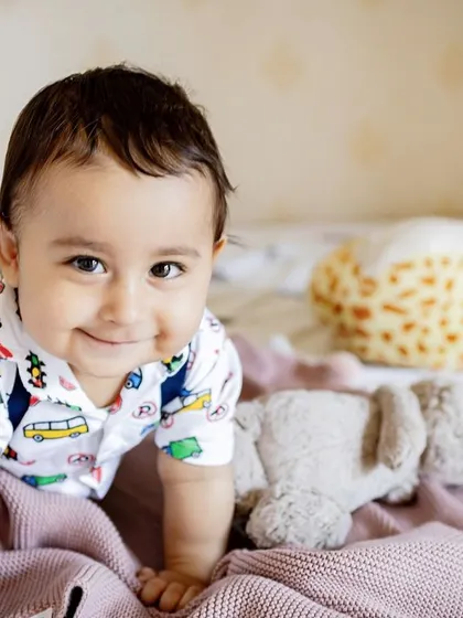 This sweet boy is on the move. Capturing milestones like crawling is perfect for an at-home session where your baby feels most comfortable to explore.