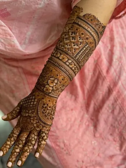 This is a detailed view of my intricate bridal henna work. Each design is unique, combining traditional patterns like paisleys and mandalas with fine-line fillers to create a stunning, full-coverage look for your special day.