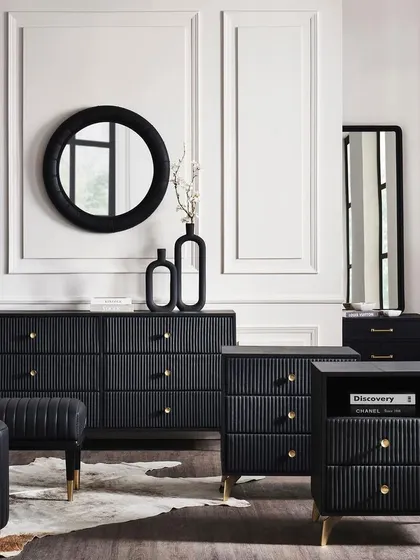 A full bedroom furniture collection in a dramatic black finish. This group shot presents a complete, cohesive look for customers wanting to furnish an entire room.