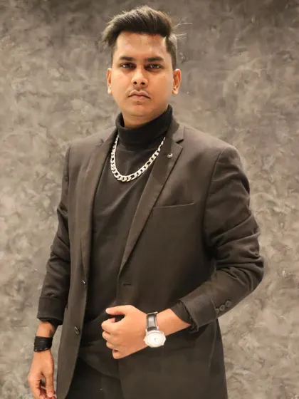 A confident pose for the camera. I bring this confidence to every performance.