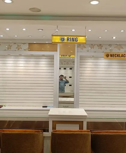 The "before" shot of a jewellery store, showing the outdated displays we were tasked to renovate.