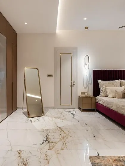 Another view of the master bedroom, highlighting the fluted glass wardrobe and the elegant proportions of our custom bed.