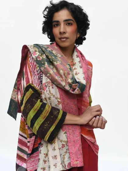 A vibrant, multi-patterned look that celebrates color and craftsmanship. This image shows how to fearlessly mix prints for a stunning result.
