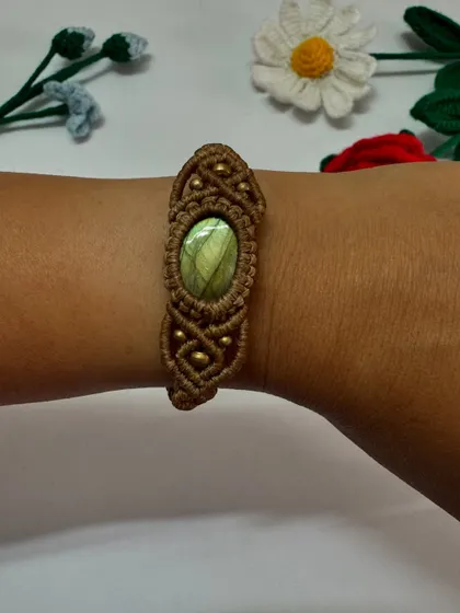 A similar design for men, this macrame bracelet features a beautiful Labradorite stone set in a light brown cord.
