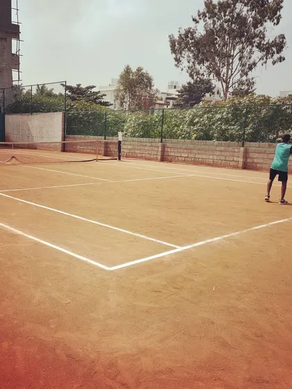 A player practices on the far court during the Tennis360 UTR Tour.