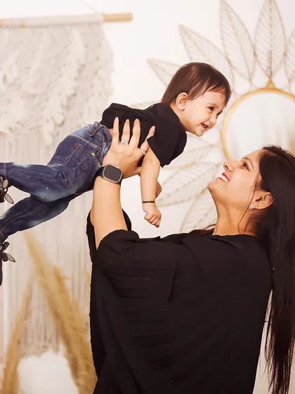 Another joyful "flying baby" moment, this time with mom. The genuine laughter and connection are what I strive to capture in every family session.