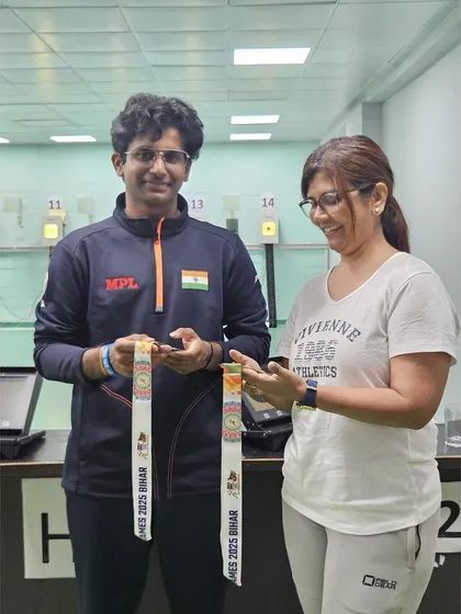A candid moment between coach and athlete. Suma Shirur and Parth Mane celebrate his success after the Khelo India Youth Games, showcasing the personal connection our coaches have with their shooters.