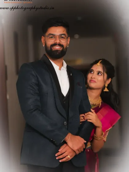A classic reception portrait. The bride's adoring gaze at her partner makes this a simple yet powerful photograph that speaks volumes about their bond.