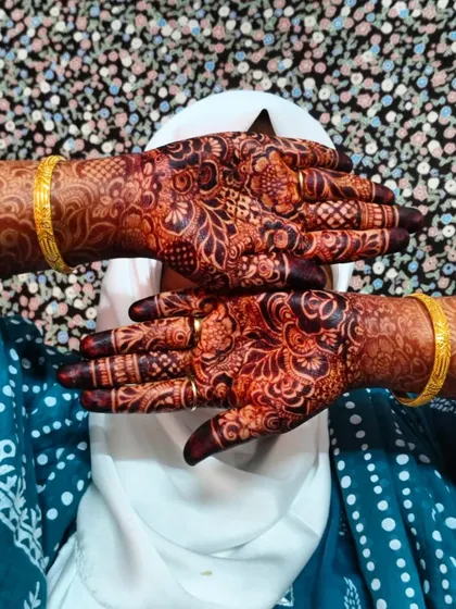 A close-up of the palms, showcasing the deep, dark color achieved with my organic henna.
