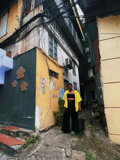 Finding beauty in the narrow, rustic alleys of Hanoi. My casual travel style is all about being ready for adventure while still feeling good in what I'm wearing.