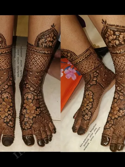 Another view of the intricate foot and leg design, showing the beautiful floral and geometric patterns.