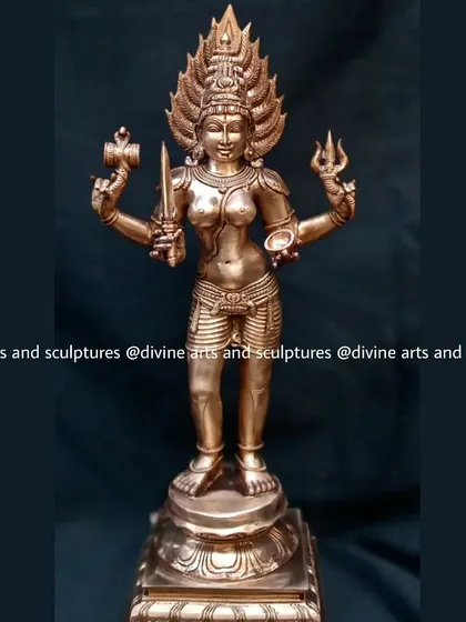 A finished bronze sculpture of Mariamman, the goddess of rain and health. This piece, with its fiery crown, was crafted for a devotee in Malaysia.