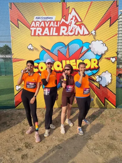 A group of our female finishers at the Aravali Trail Run, proudly displaying their medals.
