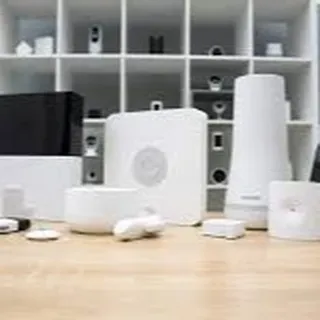We work with a wide array of high-quality smart home and security devices. This image displays a selection of the components we use, including central hubs, motion sensors, and door sensors, allowing us to build a customized solution for your specific needs.