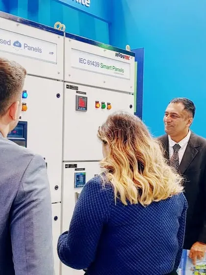 Demonstrating my smart energy management solutions to a diverse group of attendees at MEE 2025.